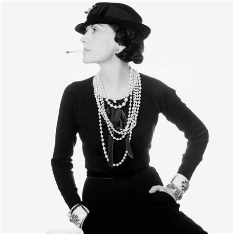 Coco Chanel wearing pearls